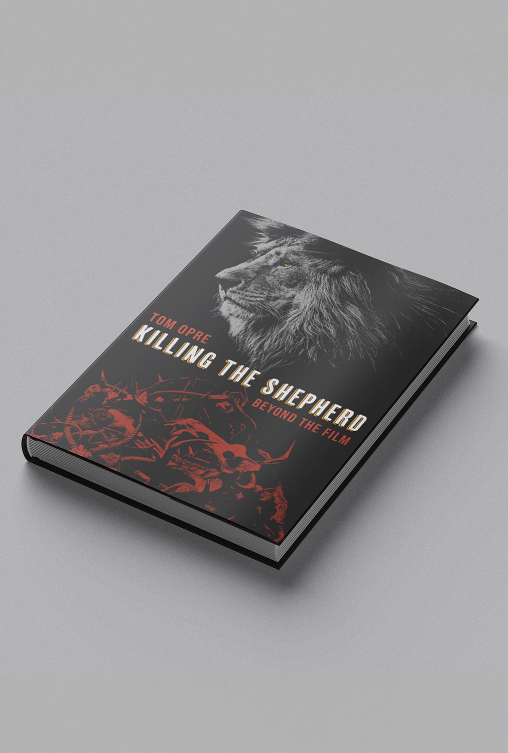 Book titled 'Killing the Shepherd' by Tom Opre with a lion illustration on a gray background
